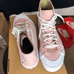 Pink high top vans